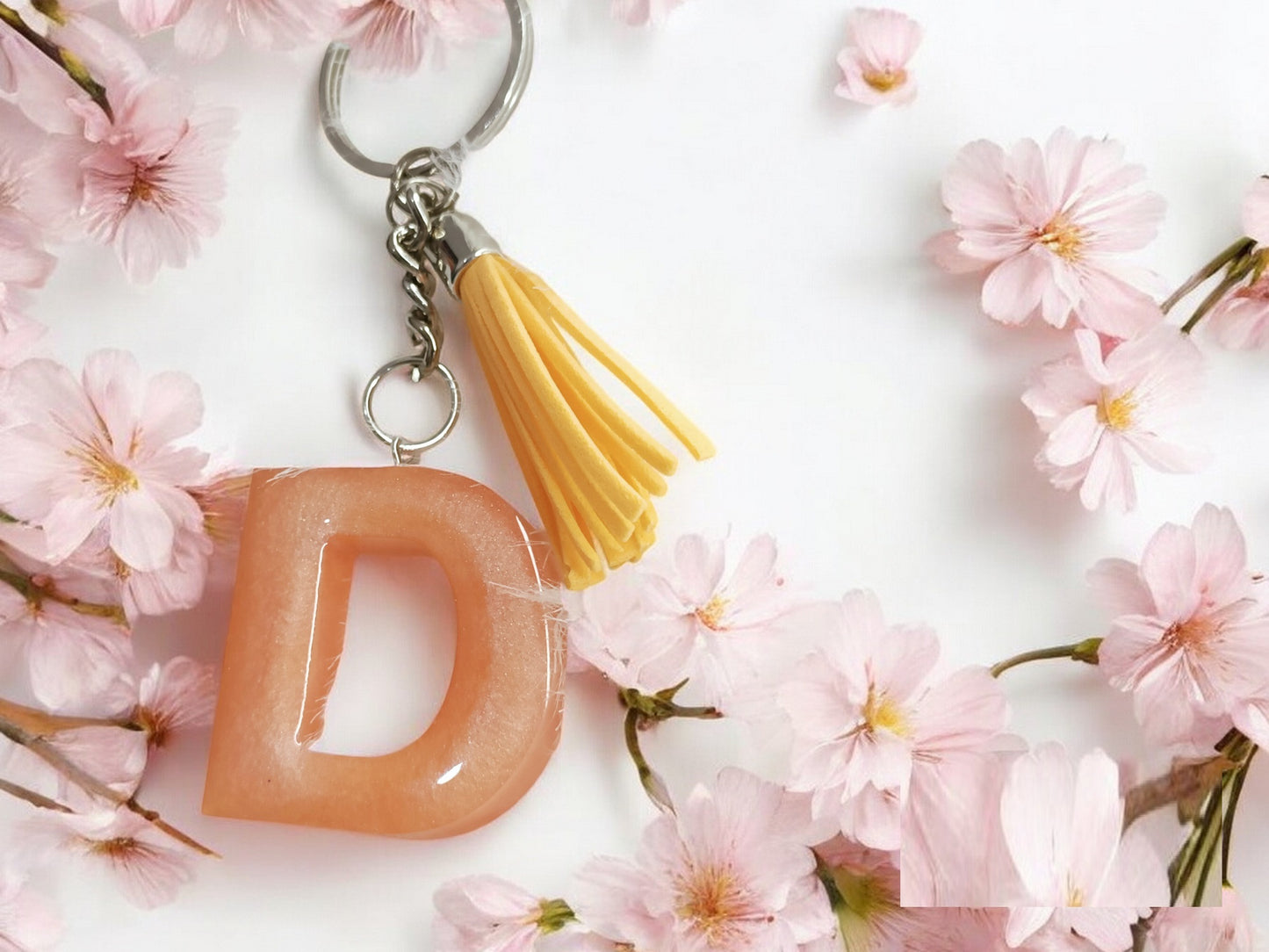 Haute Crafts Shiny Peach ("D")- with Tassel, Resin Alphabet Initial Letter Keychain Key Ring for Women Girls Purse Handbags, Bike, Car Keyring ("D")