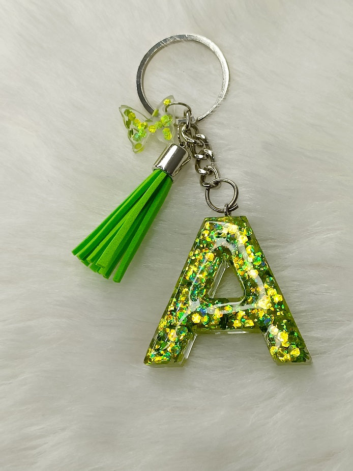 Haute Crafts Shiny Glittery Green ("A")- with small Butterfly & Tassel, Resin Alphabet Initial Letter Keychain Key Ring for Women Girls Purse Handbags, Bike, Car Keyring ("A")