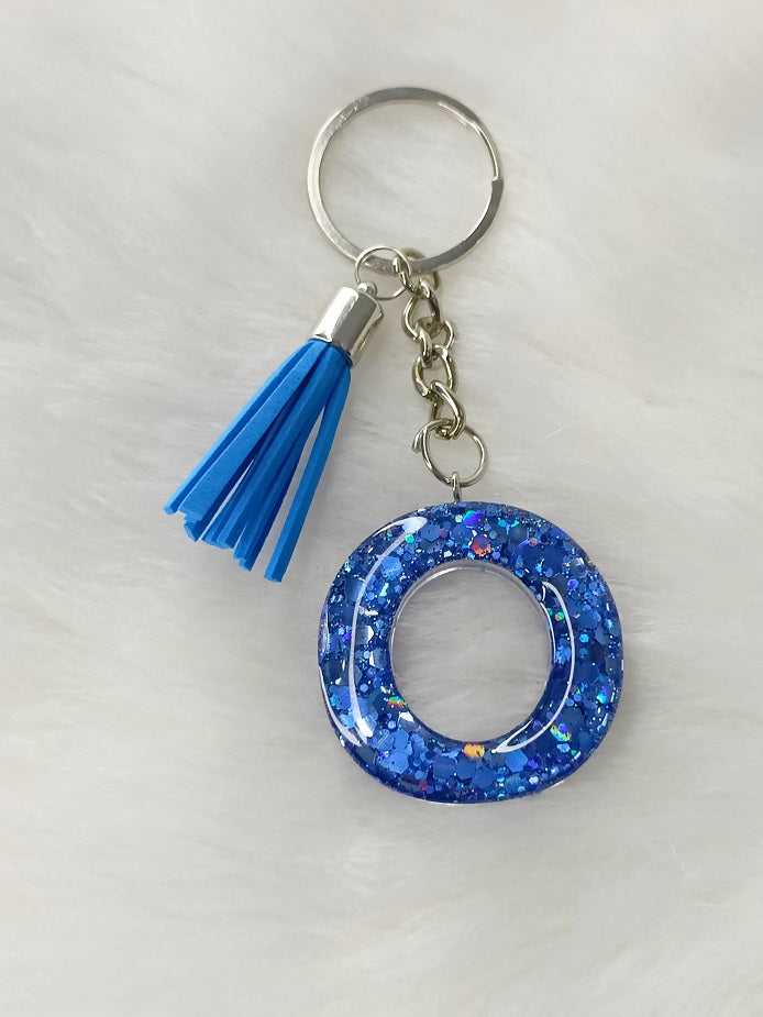 Haute Crafts Shiny Glittery Blue ("O")- with Tassel, Resin Alphabet Initial Letter Keychain Key Ring for Women Girls Purse Handbags, Bike, Car Keyring ("O")