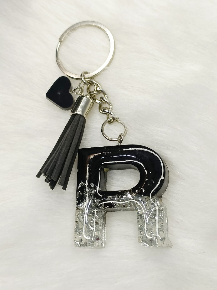 Haute Crafts Shiny Black & Silver ("R")- with small Heart & Tassel, Resin Alphabet Initial Letter Keychain Key Ring for Women Girls Purse Handbags, Bike, Car Keyring ("R")