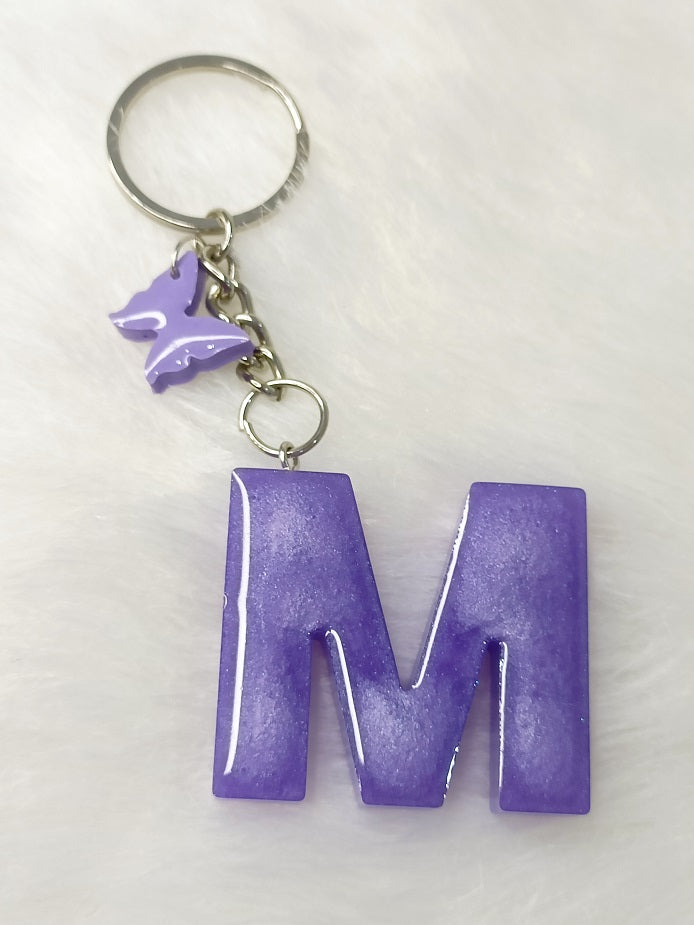 Haute Crafts Glass Shiny Purple ("M")- with small Butterfly, Resin Alphabet Initial Letter Keychain Key Ring for Women Girls Purse Handbags, Bike, Car Keyring ("M")