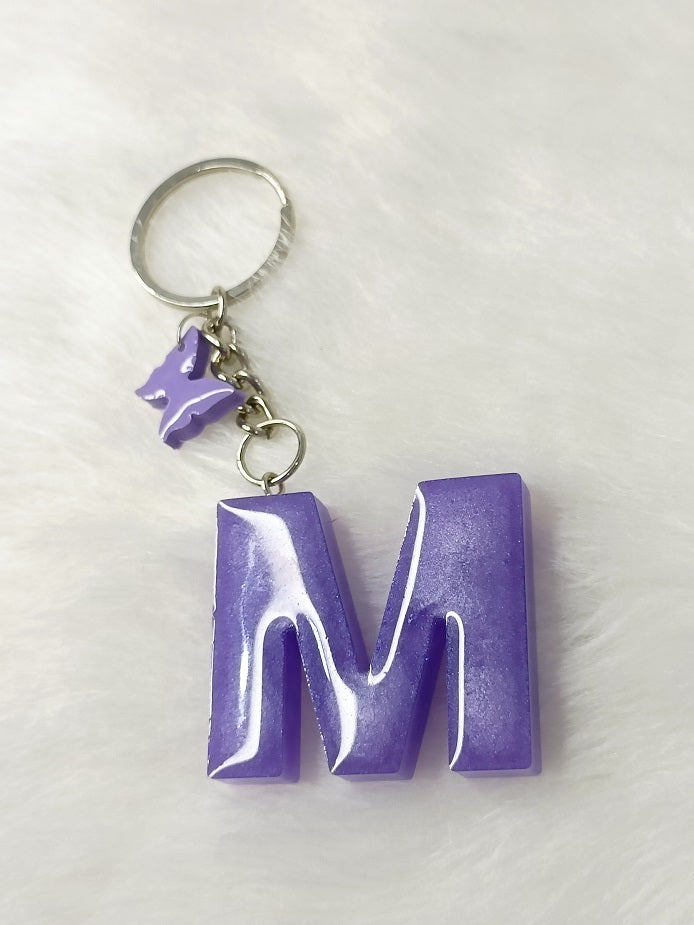 Haute Crafts Glass Shiny Purple ("M")- with small Butterfly, Resin Alphabet Initial Letter Keychain Key Ring for Women Girls Purse Handbags, Bike, Car Keyring ("M")