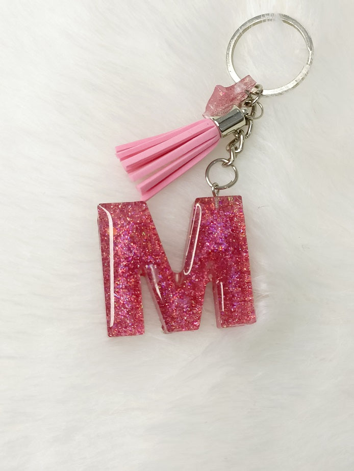 Haute Crafts Giltery Shiny Pink ("M")- with small Butterfly& Tassel, Resin Alphabet Initial Letter Keychain Key Ring for Women Girls Purse Handbags, Bike, Car Keyring ("M")