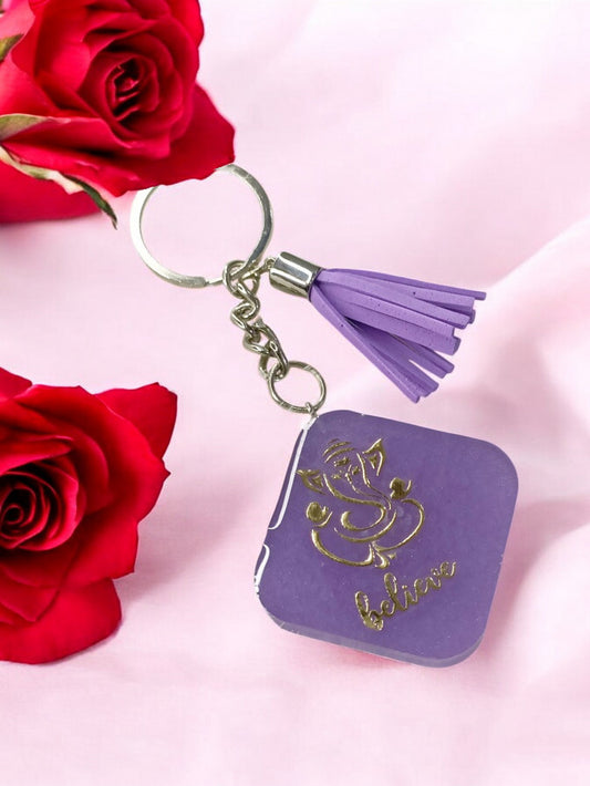 Haute Crafts "Ganesh ji "Theme with Tassel ,Resin Keychain Key Ring for Women, Girls Purse ,Handbags, Car, Bike.