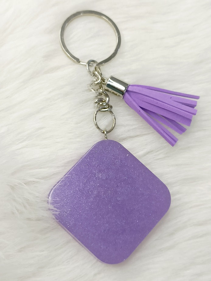 Haute Crafts "Ganesh ji "Theme with Tassel ,Resin Keychain Key Ring for Women, Girls Purse ,Handbags, Car, Bike.