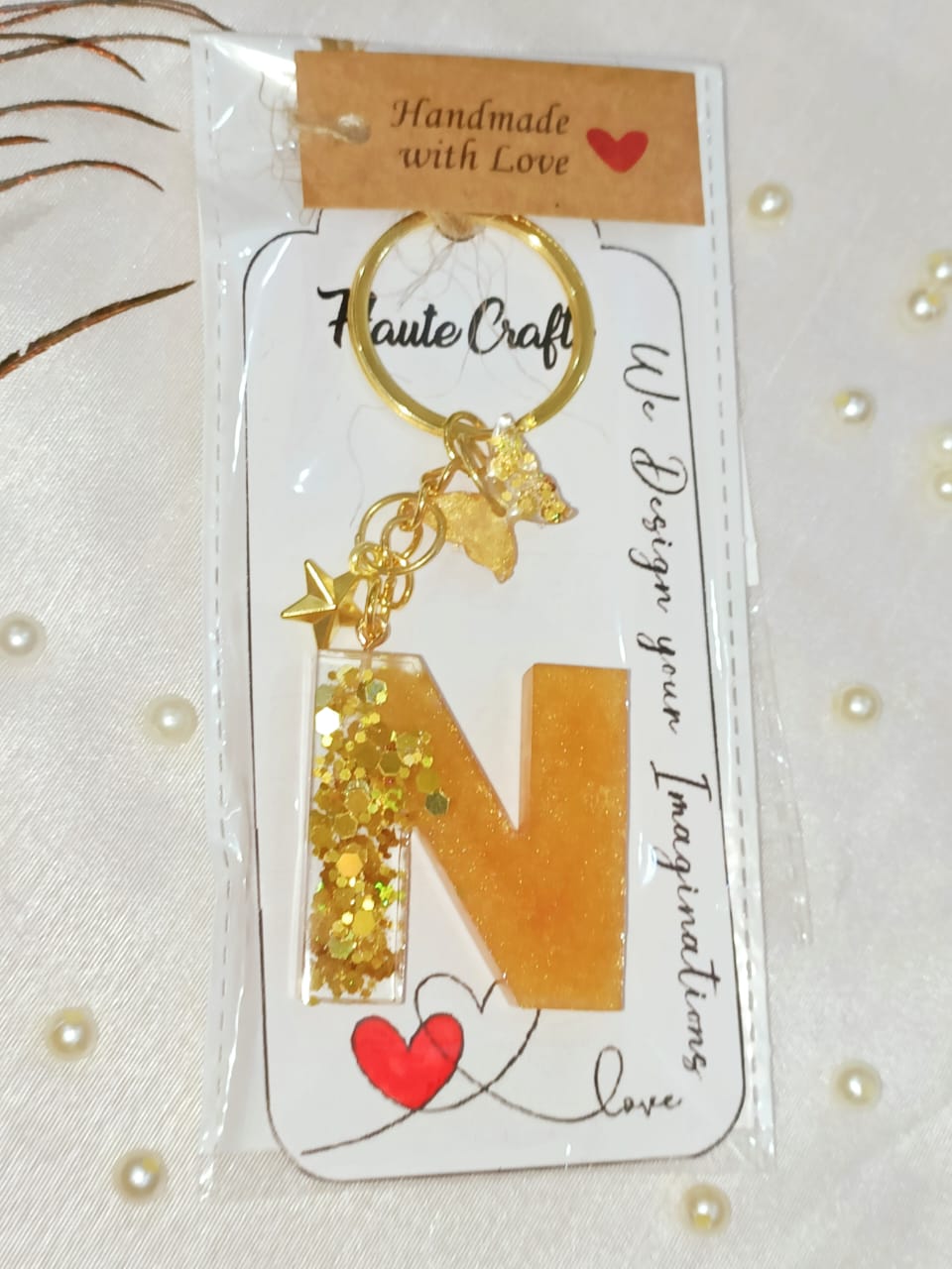 Haute Crafts Shiny Glittery Golden ("N")- with Golden star & Butterfly, Resin Alphabet Initial Letter Keychain Key Ring for Women Girls Purse Handbags, Bike, Car Keyring, Home, Small Gifts, ("N")