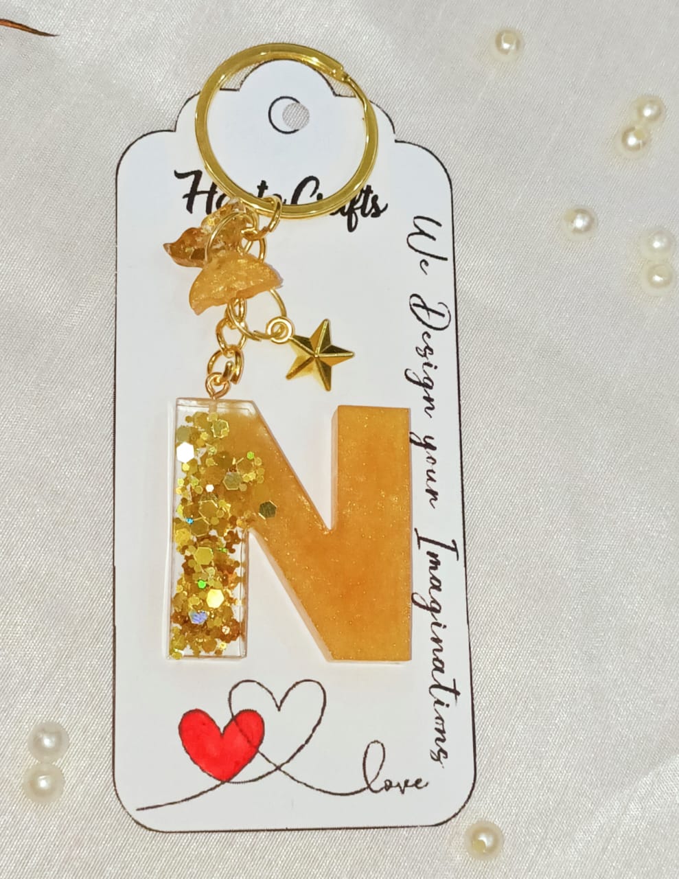 Haute Crafts Shiny Glittery Golden ("N")- with Golden star & Butterfly, Resin Alphabet Initial Letter Keychain Key Ring for Women Girls Purse Handbags, Bike, Car Keyring, Home, Small Gifts, ("N")