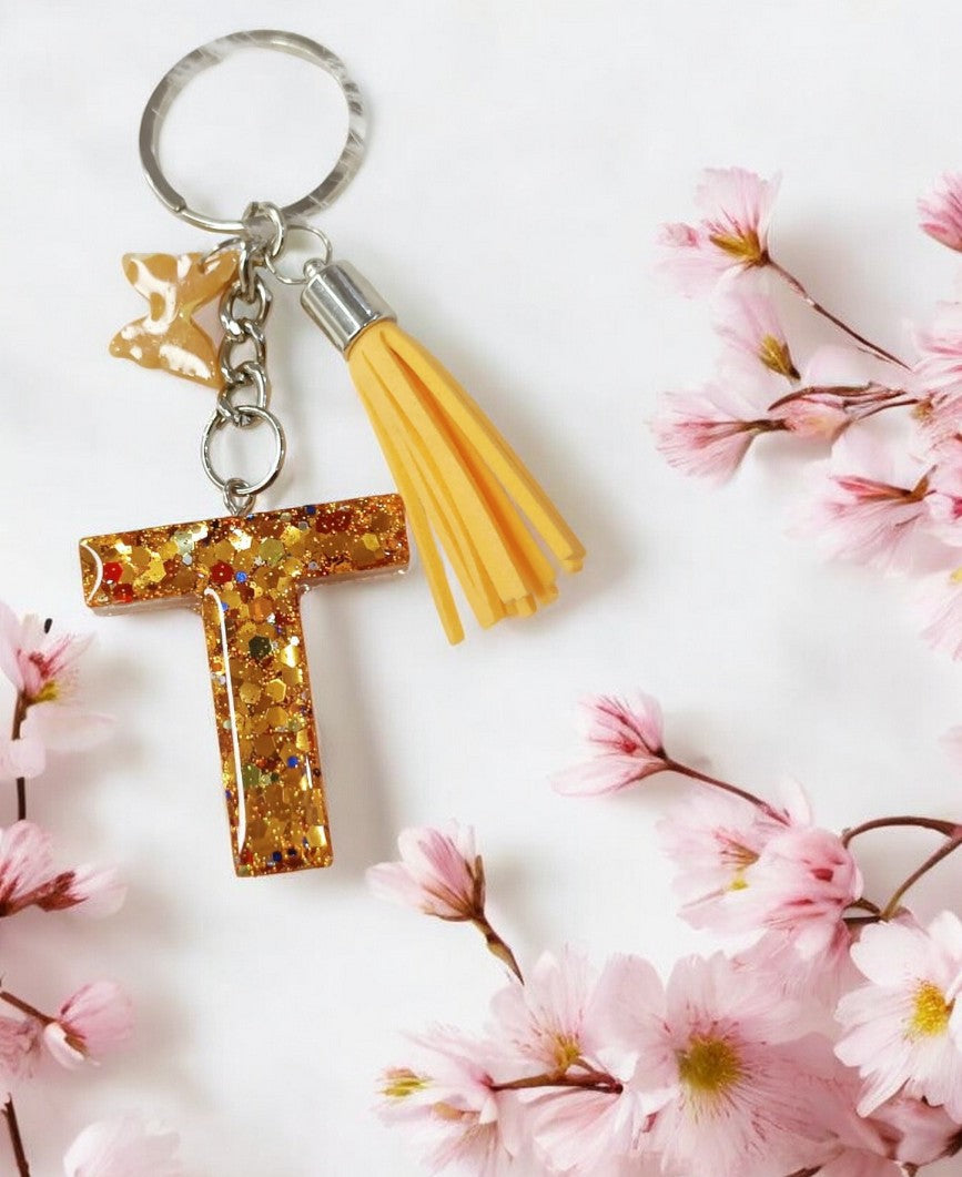 Haute Crafts Shiny Glittery Copper ("T")- with small Butterfly & Tassel, Resin Alphabet Initial Letter Keychain Key Ring for Women Girls Purse Handbags, Bike, Car Keyring ("T")