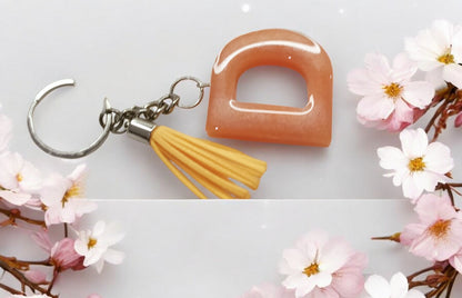 Haute Crafts Shiny Peach ("D")- with Tassel, Resin Alphabet Initial Letter Keychain Key Ring for Women Girls Purse Handbags, Bike, Car Keyring ("D")
