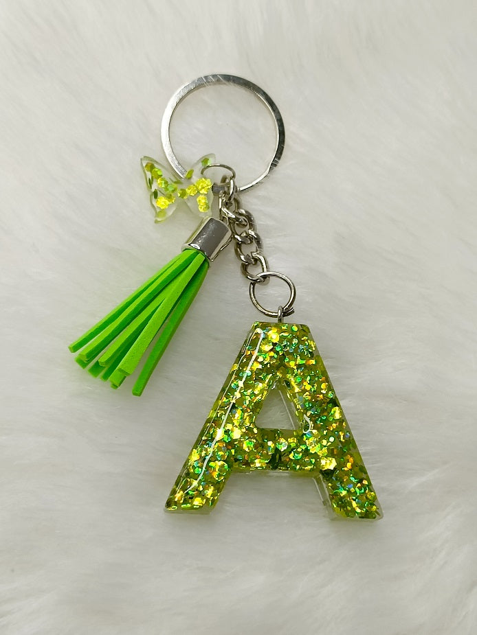 Haute Crafts Shiny Glittery Green ("A")- with small Butterfly & Tassel, Resin Alphabet Initial Letter Keychain Key Ring for Women Girls Purse Handbags, Bike, Car Keyring ("A")