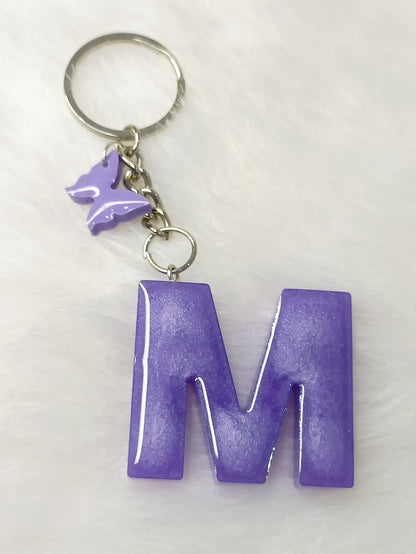 Haute Crafts Glass Shiny Purple ("M")- with small Butterfly, Resin Alphabet Initial Letter Keychain Key Ring for Women Girls Purse Handbags, Bike, Car Keyring ("M")
