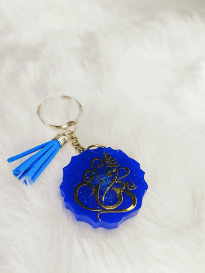 Haute Crafts Ganesh ji Theme with Tassel ,Resin Keychain Key Ring for Women, Girls Purse ,Handbags, Car, Bike.